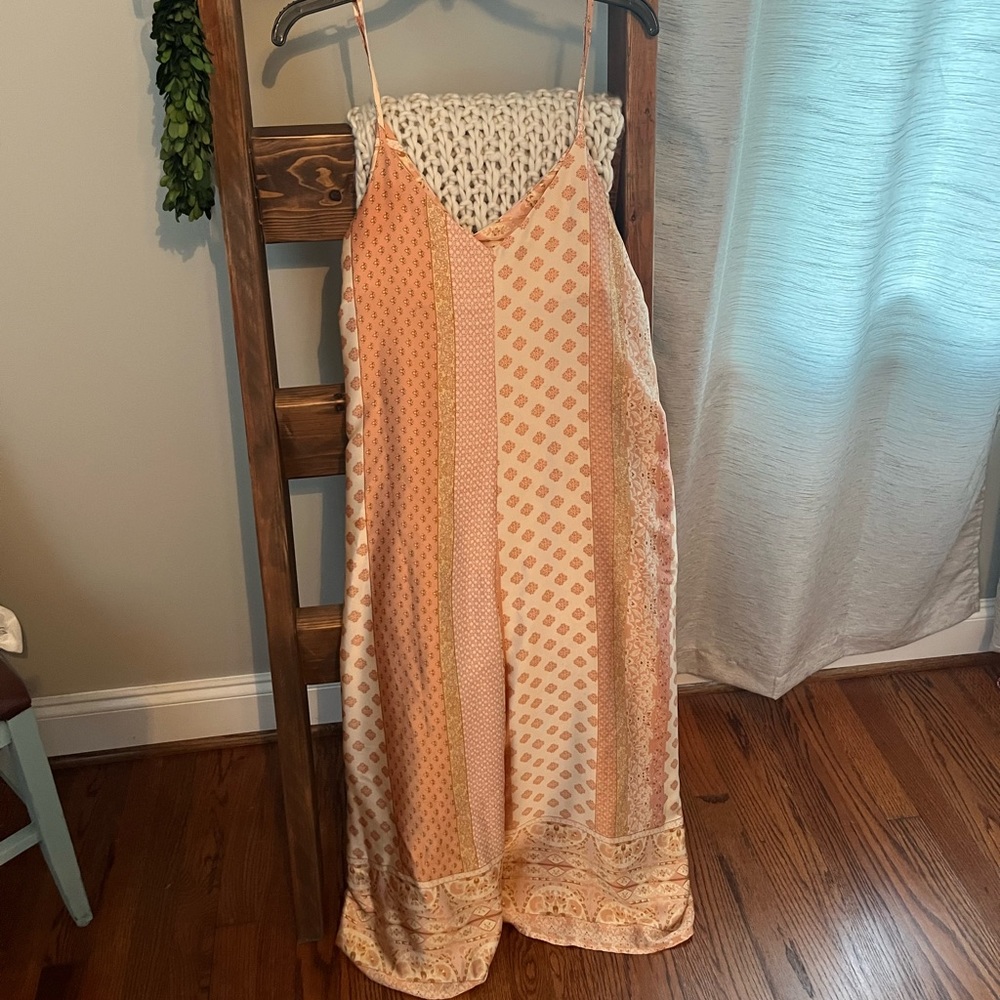 Silky spaghetti strap jumpsuit from Red Dress Boutique!